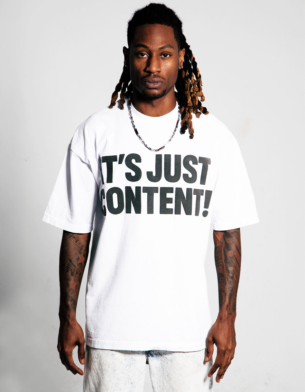 IT’S JUST CONTENT TEE